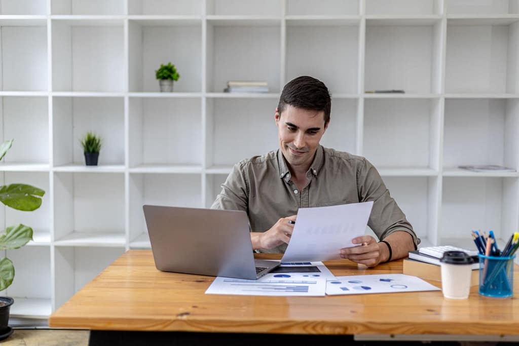 Small business owner reviewing a business funding application